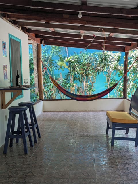 Outdoor dining/living area with hammock
