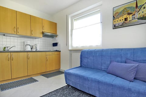 Apartment | Private kitchen | Electric kettle, highchair