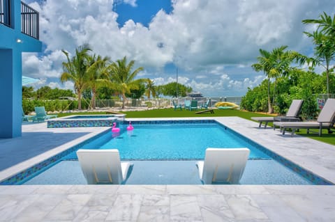 Luxury saltwater pool and spa with bay views made for family memories
