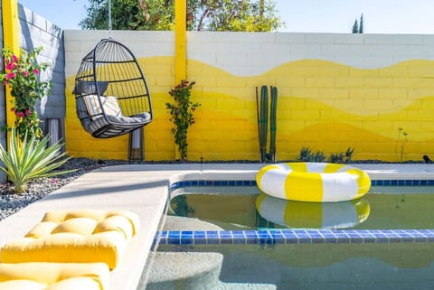 Relax by the pool and enjoy the perfect desert oasis vibes. (Floaties not provided in the property)
