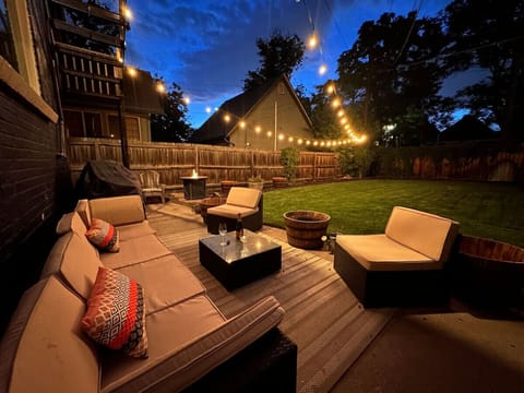 Imagine relaxing on this beautiful patio, surrounded by friends, warmth from the fire pit, and laughter filling the air.