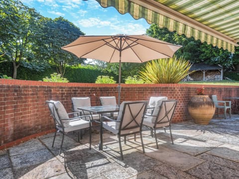 Outdoor eating area | Orchard Cottage, Over Wallop, near Stockbridge