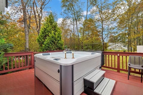 Experience the bliss of hydrotherapy in our spacious hot tub,