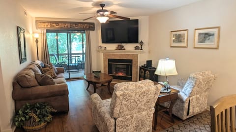 Living room with access to screened in back deck