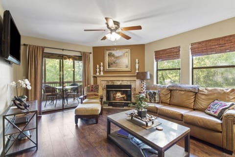 View of the Main Living Area with 50in Flat Screen Wall Mounted TV & Fireplace