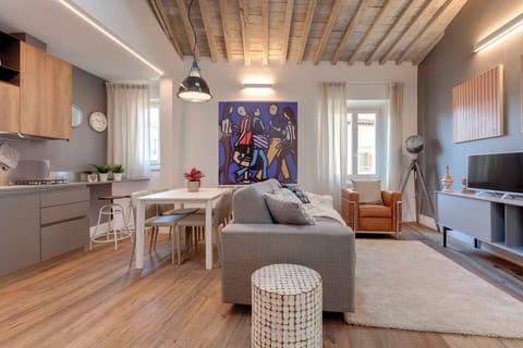 Apartment | Living area | 24-inch flat-screen TV with digital channels