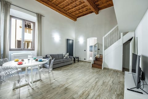 Apartment | Living area | 24-inch flat-screen TV with digital channels