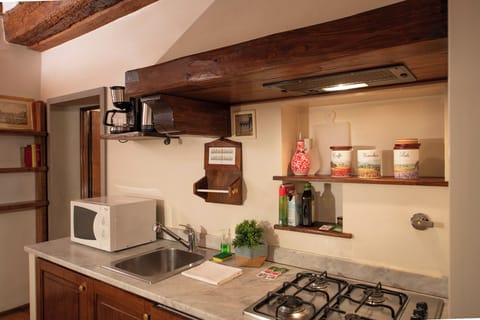 Apartment | Private kitchenette | Full-size fridge, microwave, oven, stovetop