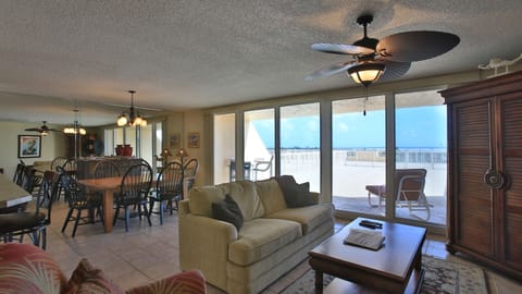 Spacious and comfortable living room and dining room overlooking the large patio!