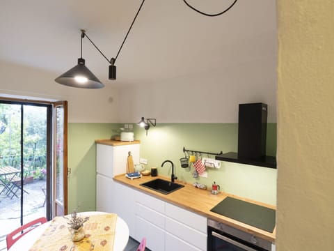 Cabinetry, Property, Countertop, Wood, Interior Design, Lighting, Drawer, Sink, Floor, Flooring