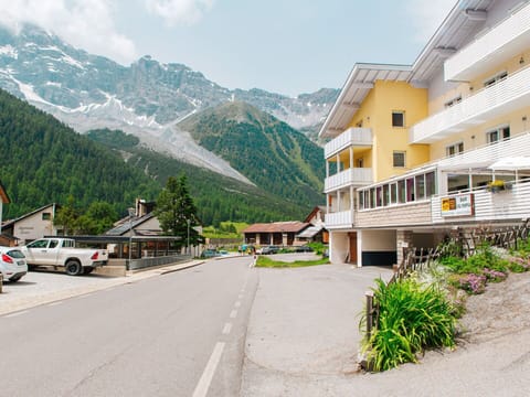 Sky, Cloud, Mountain, Building, Property, Plant, Window, Wheel, Car, House