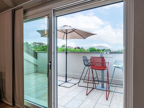 Building, Property, Shade, Sky, Plant, Cloud, Wood, Outdoor Furniture, Interior Design, Table