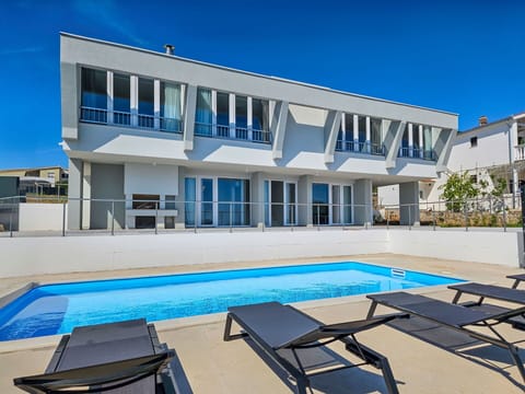 Sky, Property, Window, Building, Swimming Pool, Furniture, Blue, Azure, Shade, Outdoor Furniture
