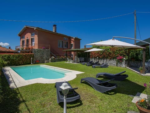 Sky, Property, Building, Plant, Window, Swimming Pool, Shade, Outdoor Furniture, Land Lot, House