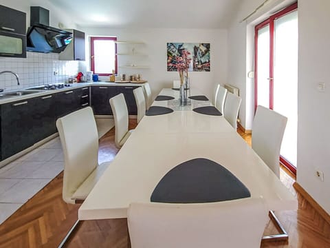 Furniture, Interior Design, Flooring, Floor, Wood, Table, Ceiling, Chair, Lighting, Room