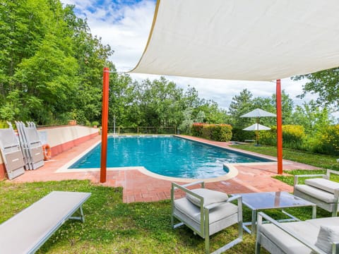 Water, Plant, Building, Property, Swimming Pool, Sky, Tree, Outdoor Furniture, Shade, Condominium