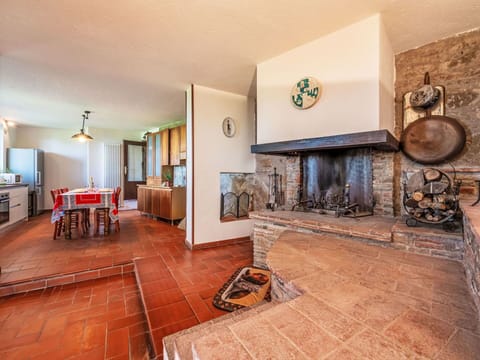 Flooring, Furniture, Ceiling, Interior Design, Floor, Room, Living Room, Hearth, Chair, Wood Stain