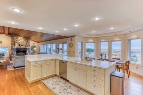 Spacious kitchen with plenty of counter space, ensuring no stepping on toes while cooking—perfect for meal prep and family gatherings.