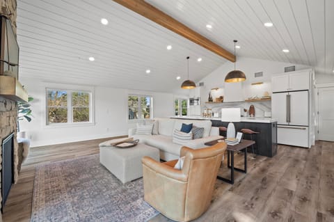 Main house living room - enjoy a large Pottery Barn couch, Smart TV & fireplace