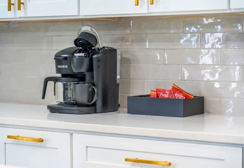 Your morning coffee routine just got an upgrade! Enjoy a fresh brew from the coffee bar, conveniently located in the kitchen.