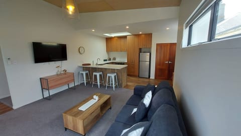 Living room with view to kitchen