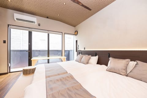 House, Balcony | 2 bedrooms, down comforters, desk, laptop workspace