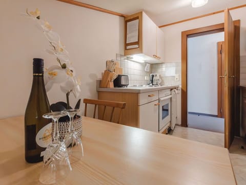 Furniture, Cabinetry, Table, Bottle, Wood, Countertop, Kitchen, Interior Design, Barware, Flooring