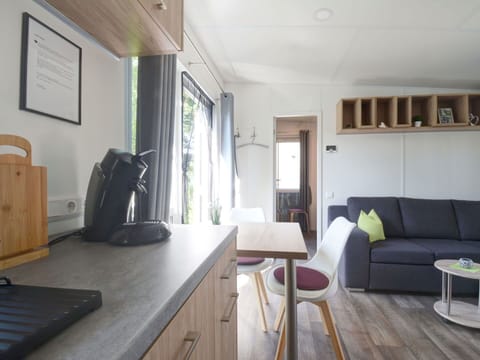 Table, Furniture, Cabinetry, Couch, Wood, Countertop, Interior Design, Architecture, Picture Frame, Comfort
