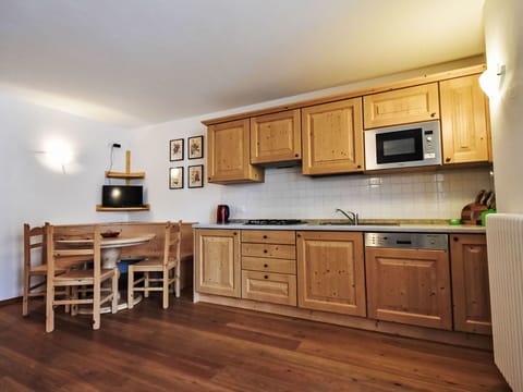 Cabinetry, Countertop, Furniture, Wood, Drawer, Interior Design, Kitchen, Flooring, Wood Stain, Floor