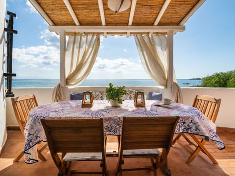 Furniture, Table, Sky, Property, Water, Chair, Plant, Blue, Interior Design, Shade