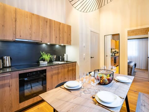 Property, Furniture, Table, Cabinetry, Countertop, Wood, Lighting, Interior Design, Flooring, Kitchen