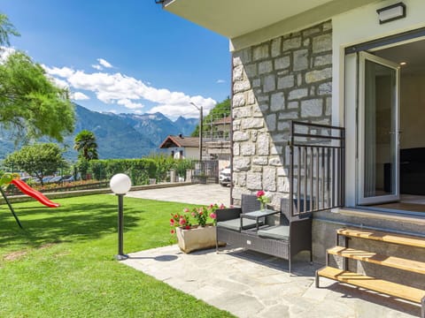 Plant, Property, Window, Building, Flower, Sky, Chair, Outdoor Furniture, Land Lot, Cottage