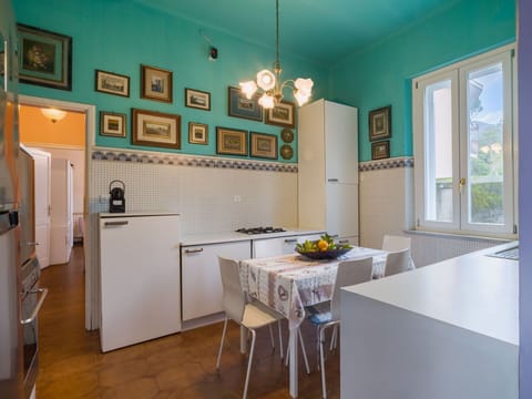 Interior Design, Flooring, Furniture, Ceiling, Floor, Kitchen, Room, Major Appliance, Lighting, Countertop