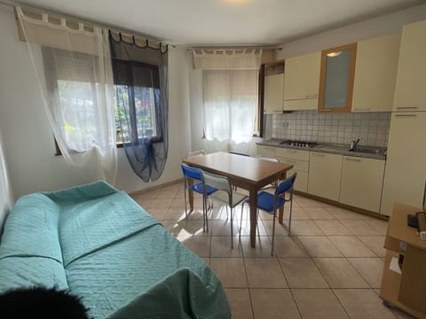 Table, Furniture, Property, Plant, Blue, Chair, Tableware, Shade, Interior Design, Outdoor Furniture