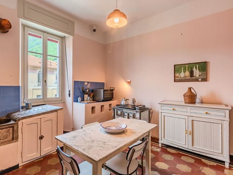 Brown, Property, Furniture, Table, Cabinetry, Wood, Drawer, Interior Design, Lighting, Window