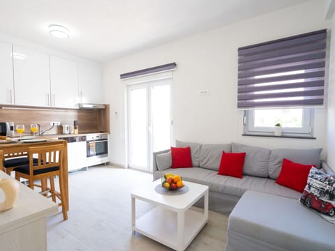 Furniture, Table, Couch, Window, Countertop, Building, Comfort, Cabinetry, Lighting, Studio Couch