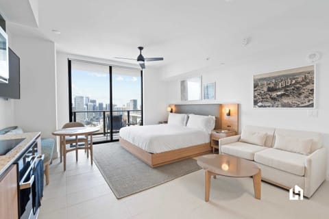 Modern Brickell studio with king bed, kitchenette & stunning city views.