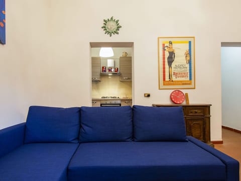 Property, Furniture, Azure, Couch, Lighting, Interior Design, Comfort, Picture Frame, Wood, Floor