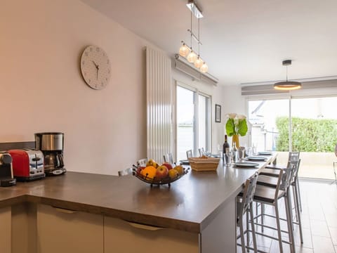 Furniture, Property, Table, Interior Design, Wood, Countertop, Window, Clock, Kitchen, Flooring