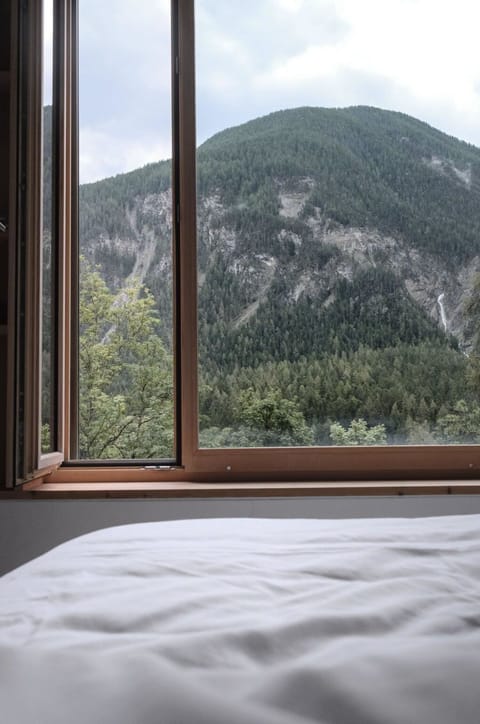 Sky, Cloud, Property, Window, Mountain, Wood, Building, Tree, Shade, Comfort