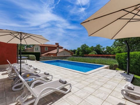 Cloud, Plant, Sky, Daytime, Property, Swimming Pool, Building, Azure, Shade, Outdoor Furniture