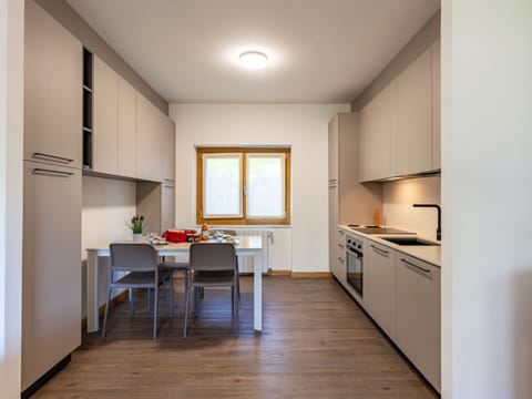 Property, Furniture, Cabinetry, Table, Countertop, Wood, Chair, Flooring, Interior Design, Floor