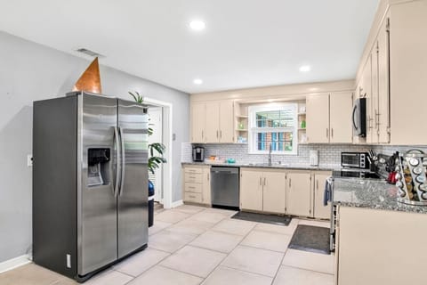Open Concept Kitchen with Stainless Steel Appliances and everything you need to make those amazing home cooked meals!