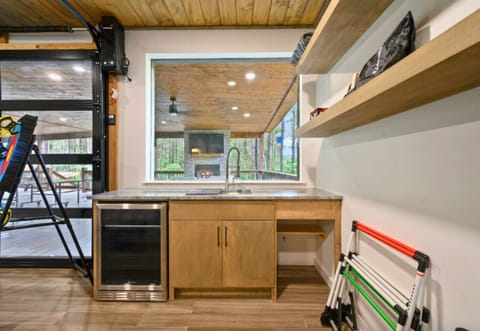 Stay refreshed with a beverage from the wet bar, complete with a mini-fridge and bar seating.