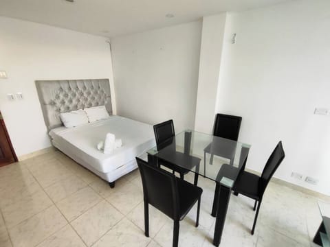 Basic Apartment | Living area | Flat-screen TV