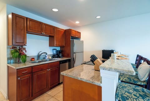 Condo, 1 King Bed with Sofa bed, Balcony, Pool View (218) | Private kitchen | Coffee/tea maker