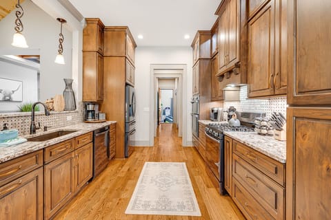 Main Level - Chef's Gourmet Kitchen w/ Stainless Steel Appliances