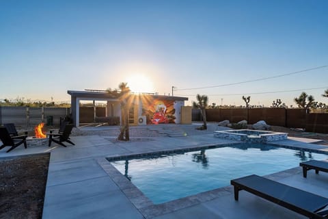 Poolside Paradise: Dive into relaxation with stunning views and a warm fire pit
