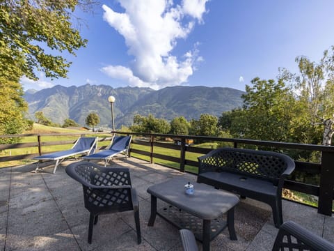 Cloud, Sky, Property, Furniture, Plant, Mountain, Outdoor Bench, Tree, Natural Landscape, Shade