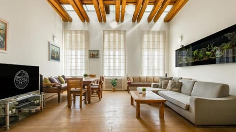 Superior Duplex, River View | Living area | 50-inch LCD TV with cable channels